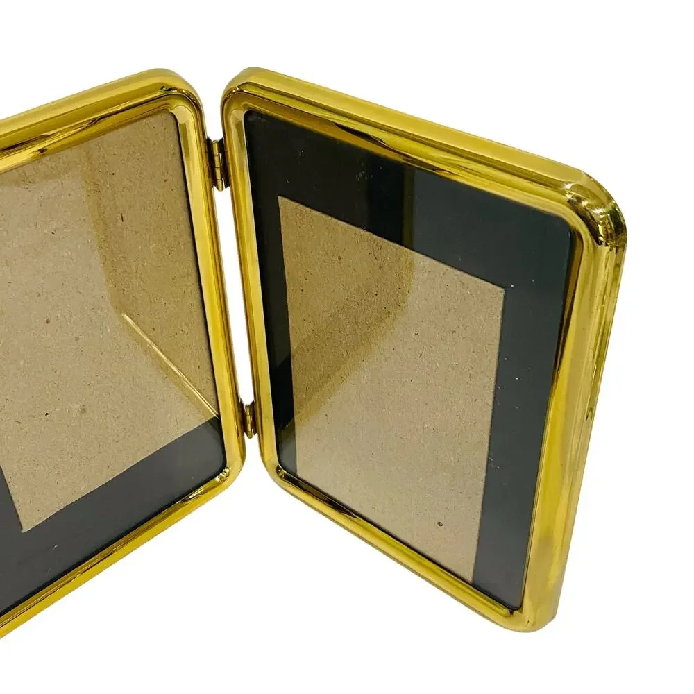 Vintage 1980's double brass photo frame free standing book style holds two 5 x 7